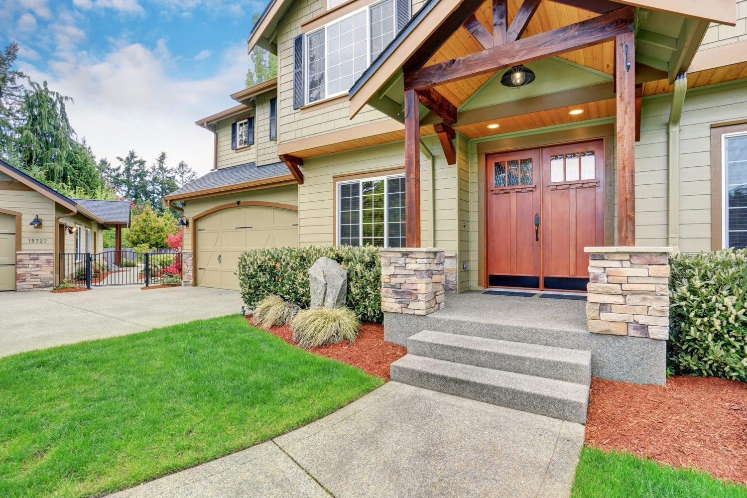 Luxurious home with large driveway.