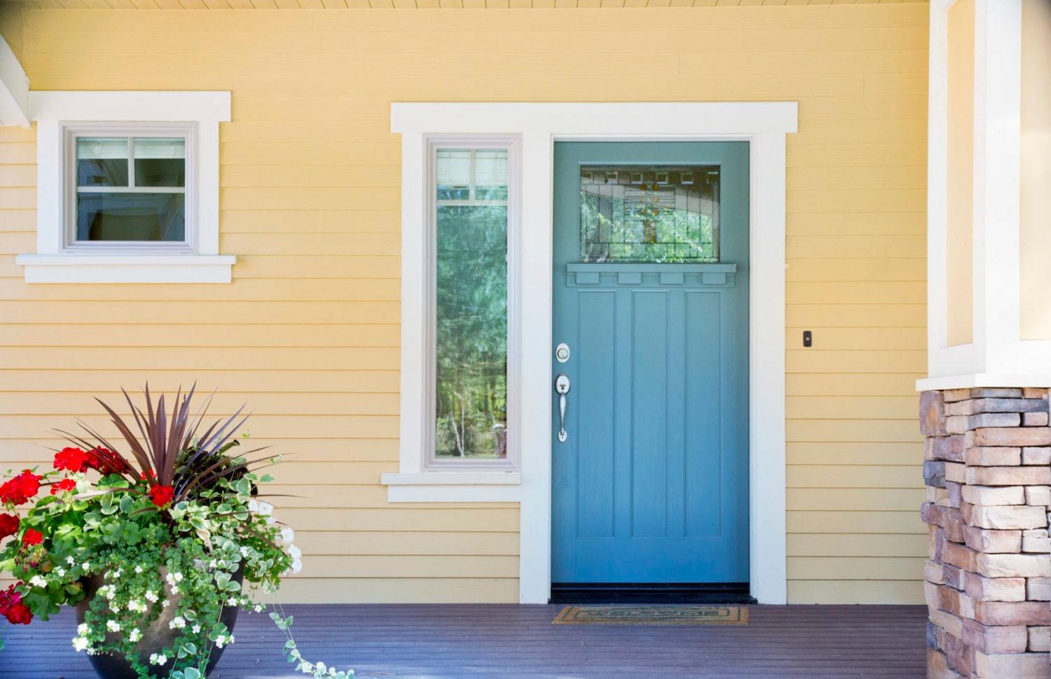 Front entrance of a home with blue door